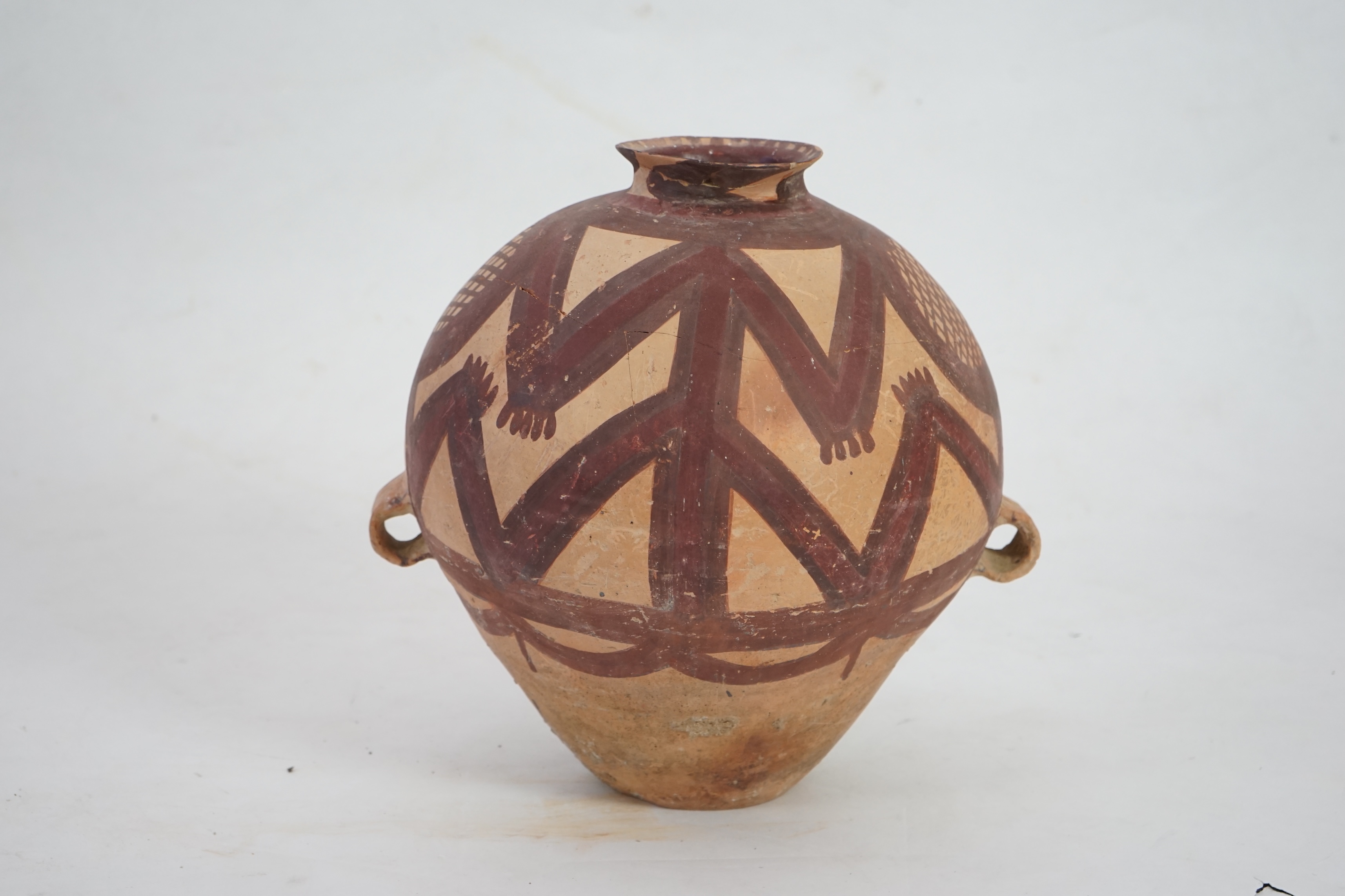 A large Chinese Neolithic Machang painted pottery jar, c.2300-2000 BC) of the Majiayao culture